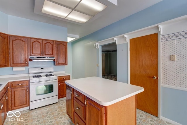 kitchen with a center island and white stove