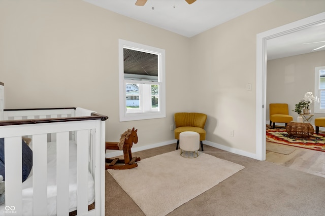 bedroom featuring ceiling fan and carpet flooring