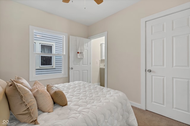 carpeted bedroom featuring ceiling fan