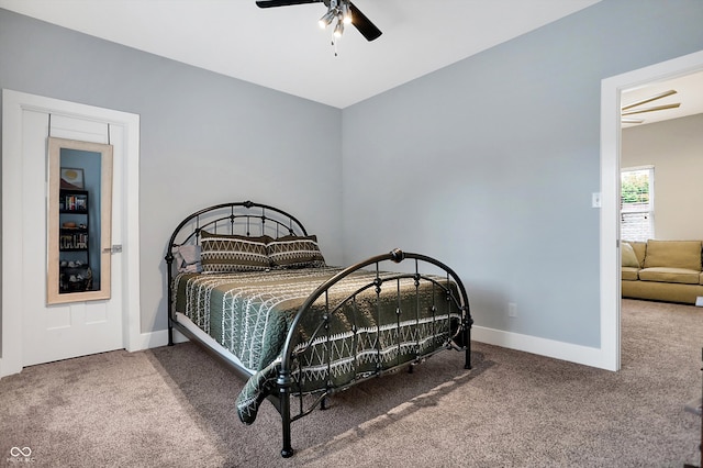 bedroom with carpet, baseboards, and ceiling fan