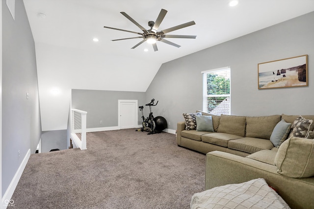 living area featuring carpet floors, lofted ceiling, ceiling fan, and baseboards