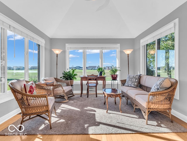 sunroom with lofted ceiling