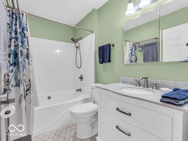 full bathroom with shower / tub combo with curtain, tile patterned flooring, vanity, and toilet