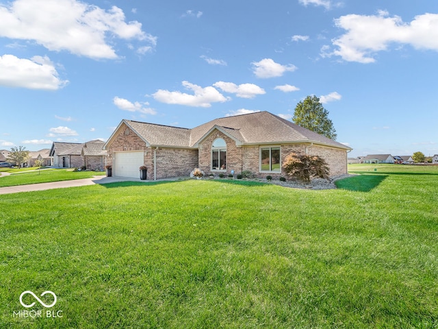 ranch-style home featuring a front yard and a garage