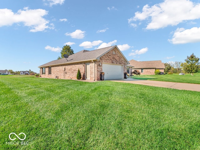 view of front of home featuring a garage and a front lawn