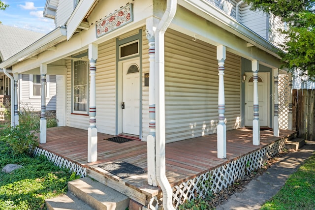 property entrance featuring covered porch