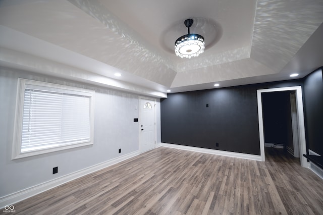 basement featuring hardwood / wood-style flooring