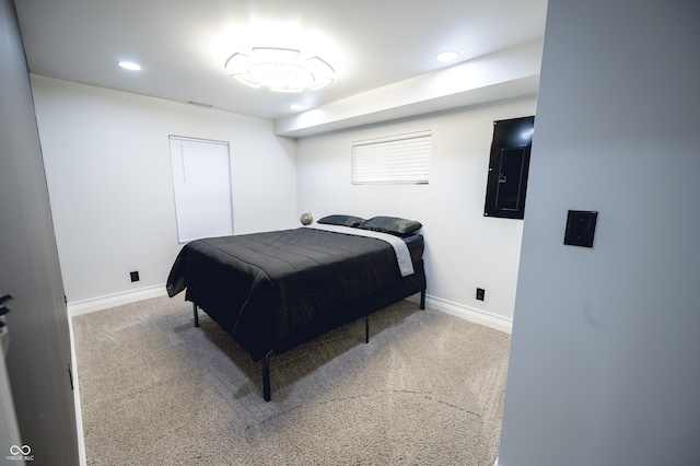 carpeted bedroom featuring electric panel