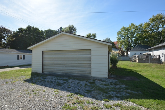 garage featuring a yard