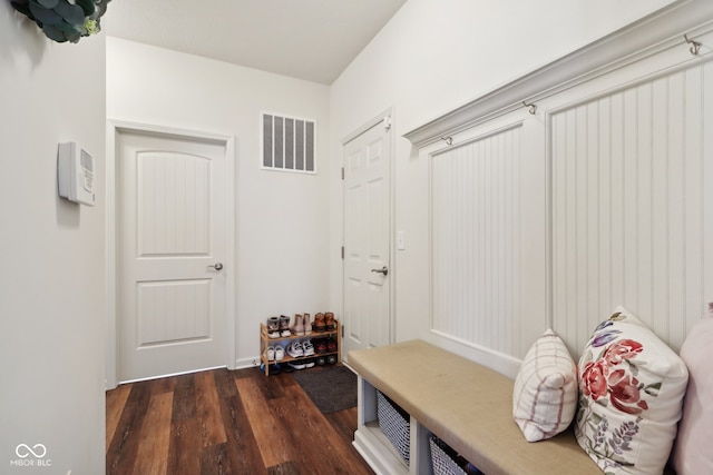 mudroom with dark hardwood / wood-style floors