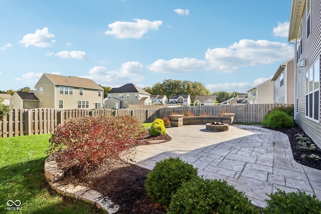 view of patio featuring a fire pit