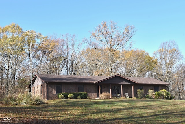 ranch-style house with a front lawn