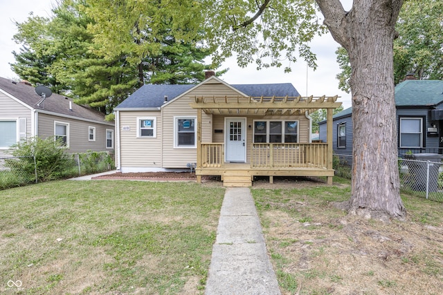 bungalow-style home with a pergola, a front lawn, and a deck