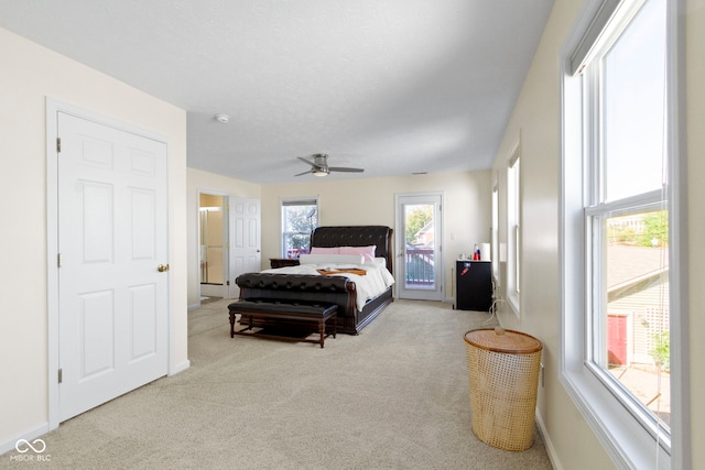 bedroom with ceiling fan and light colored carpet