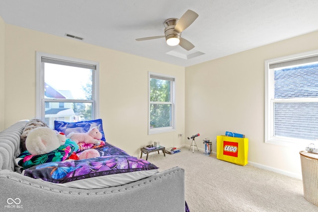 carpeted bedroom featuring ceiling fan