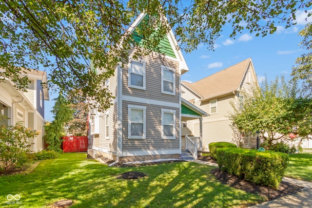 view of front of house with a front lawn