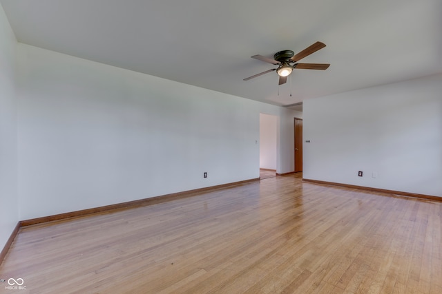 unfurnished room featuring light hardwood / wood-style floors and ceiling fan