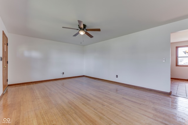 unfurnished room featuring light hardwood / wood-style flooring and ceiling fan