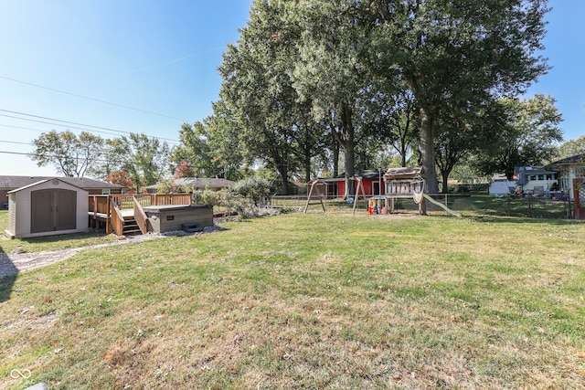 view of yard featuring a shed and a playground