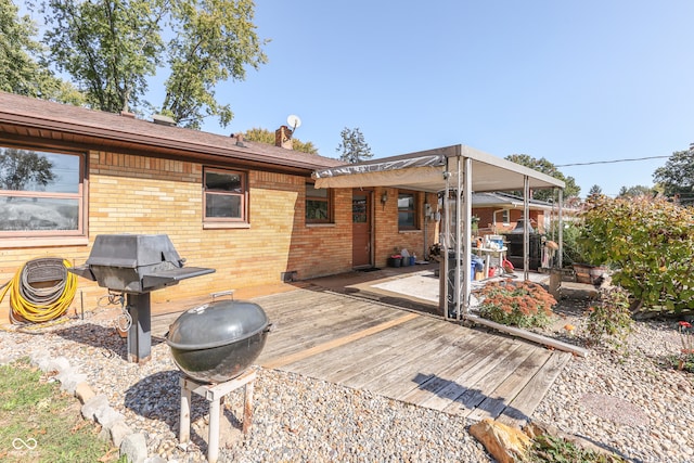 wooden deck with area for grilling