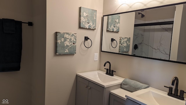 bathroom featuring vanity and an enclosed shower