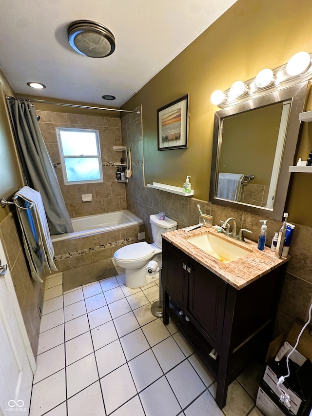 full bathroom with vanity, shower / bath combination with curtain, toilet, and tile patterned floors