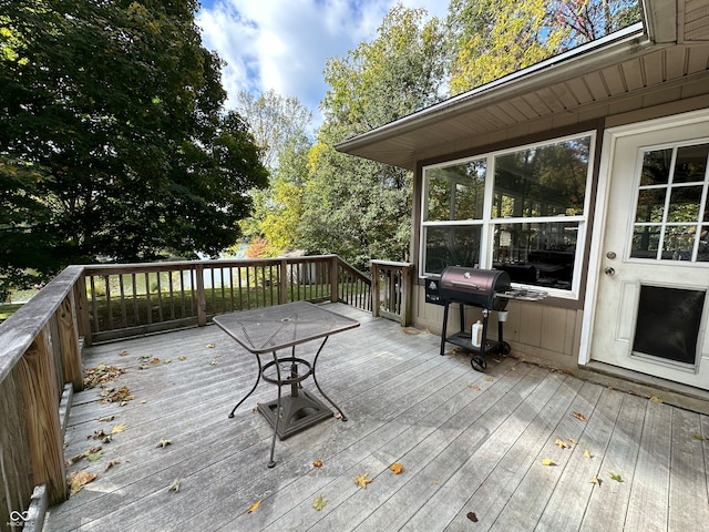 wooden deck with grilling area