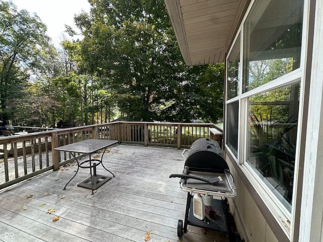 wooden deck featuring grilling area