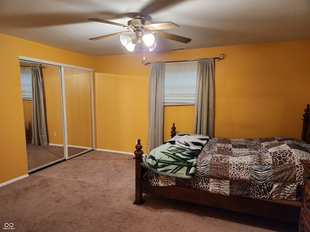 bedroom featuring a closet, ceiling fan, and carpet flooring