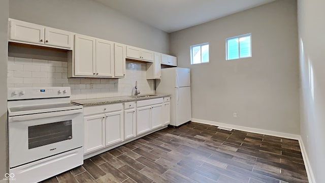 kitchen featuring white cabinetry, white appliances, sink, and dark hardwood / wood-style floors