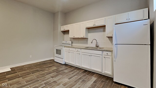 kitchen featuring white cabinets, sink, white appliances, backsplash, and dark wood-type flooring