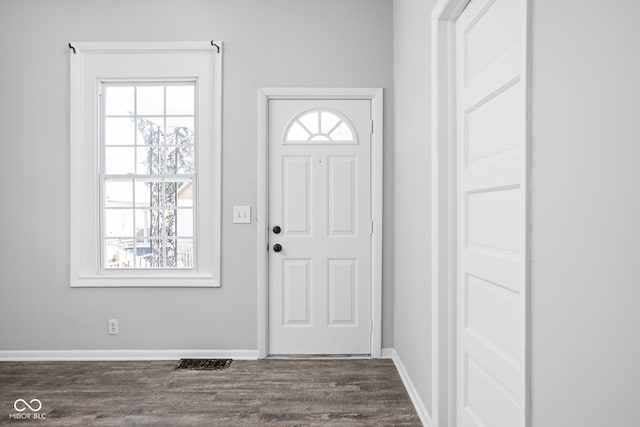 foyer featuring dark hardwood / wood-style floors