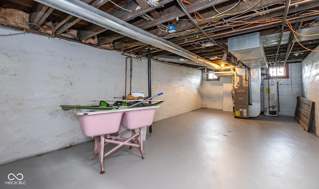 below grade area with heating unit and gas water heater