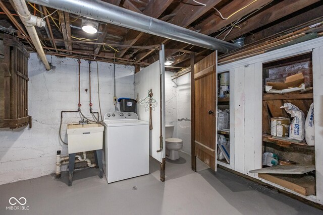 1457 Fairfield Ave, Indianapolis, IN 46205 - unfinished below grade area with washer / dryer and a sink