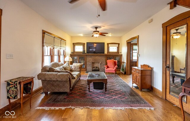 1457 Fairfield Ave, Indianapolis, IN 46205 - living area with plenty of natural light, a fireplace, and ceiling fan