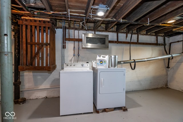 laundry room with washing machine and dryer