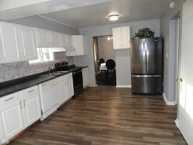 kitchen with black range with electric stovetop, stainless steel refrigerator, white dishwasher, and white cabinetry