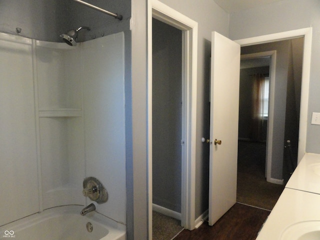 bathroom featuring vanity and bathing tub / shower combination