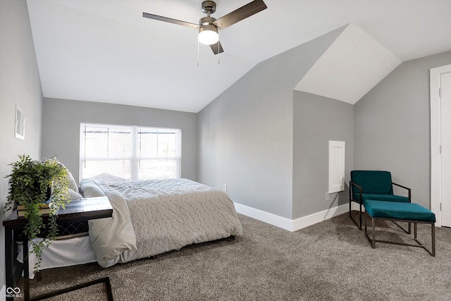 carpeted bedroom with ceiling fan and vaulted ceiling