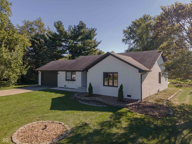 single story home with a garage and a front lawn