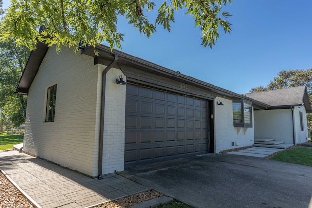 view of home's exterior featuring a garage