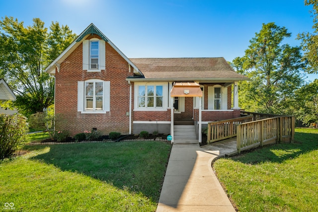 view of front of property featuring a front lawn and covered porch