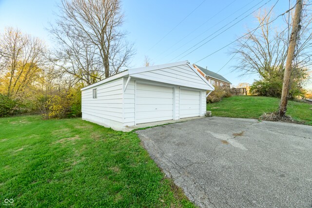 garage with a yard