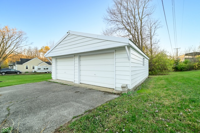 garage with a lawn