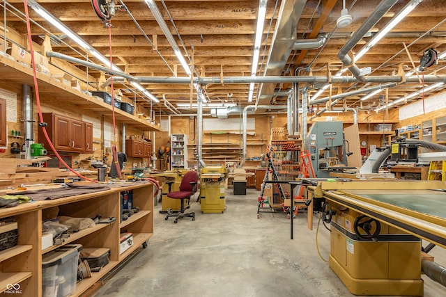 interior space with a workshop area and concrete floors