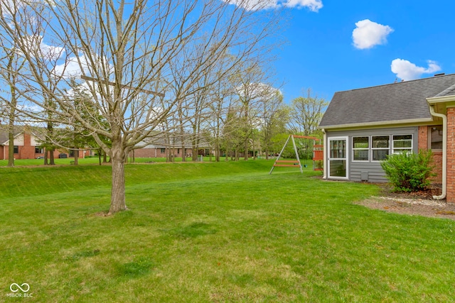 603 Ophelia Dr, Avon, IN 46123 - view of green lawn with a playground