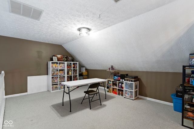 603 Ophelia Dr, Avon, IN 46123 - office area featuring a textured ceiling, vaulted ceiling, carpet flooring, and baseboards