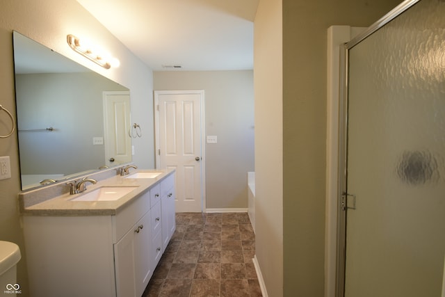 full bathroom with separate shower and tub, vanity, and toilet