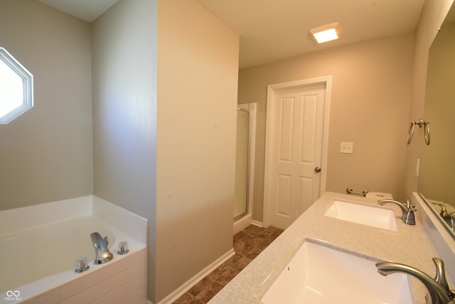 bathroom with vanity, plus walk in shower, and tile patterned floors