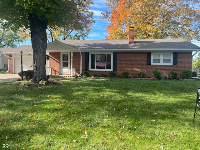 single story home with a garage and a front lawn